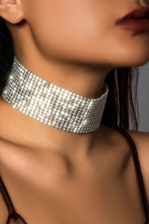 Necklace with rhinestones, silver color.