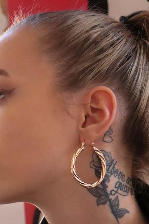 Round earrings, gold color.