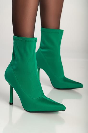 Boots with high heels, green.